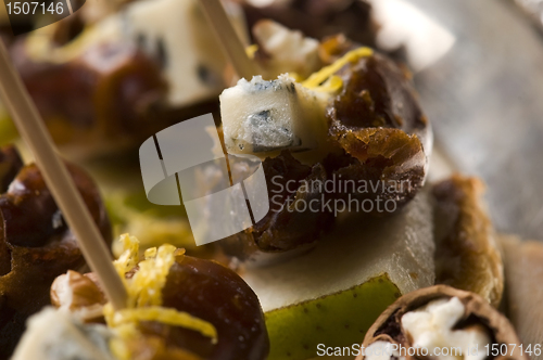 Image of Appetizer Plate with Dactyl, Pecan nuts and Cheese