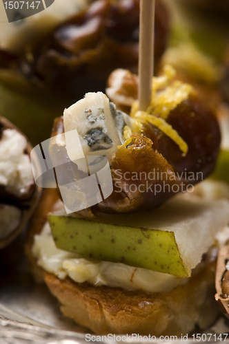 Image of Appetizer Plate with Dactyl, Pecan nuts and Cheese