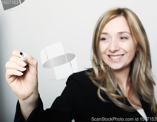 Image of woman writing