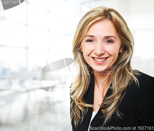 Image of smiling woman in office