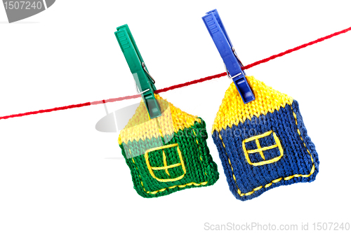 Image of two knitted colorful houses