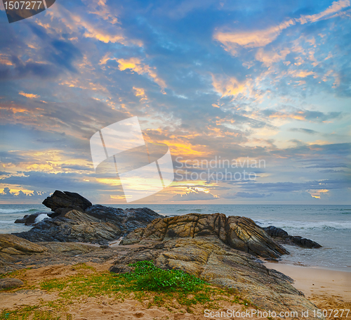 Image of ocean shore at sunset