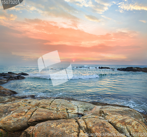 Image of ocean shore at sunset
