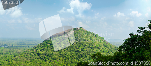 Image of view from  mount Sigiriya  into mountain in the shape of the fem