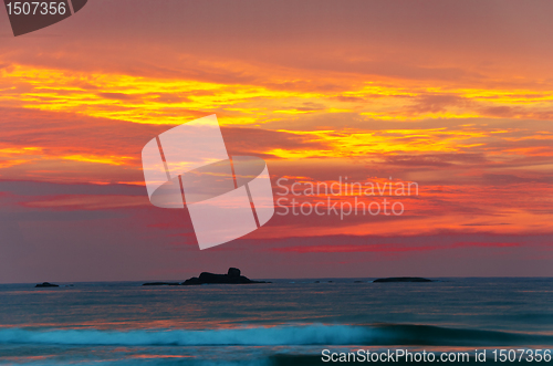 Image of ocean shore at sunset