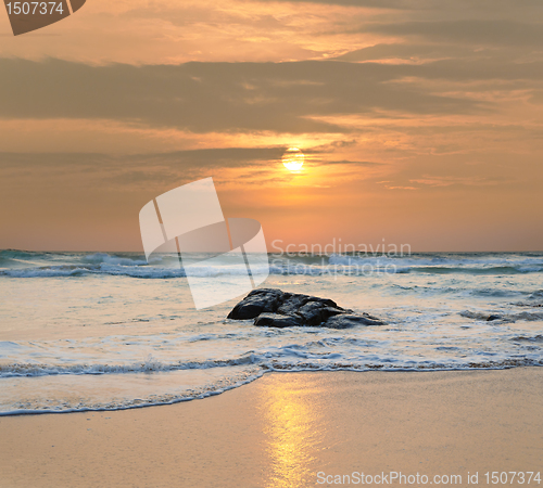 Image of ocean shore at sunset