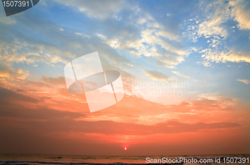 Image of ocean shore at sunset