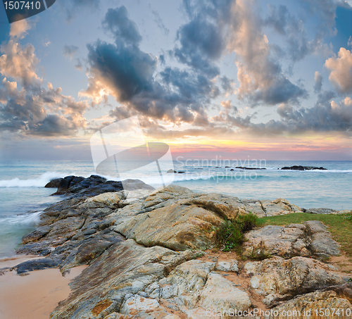 Image of ocean shore at sunset