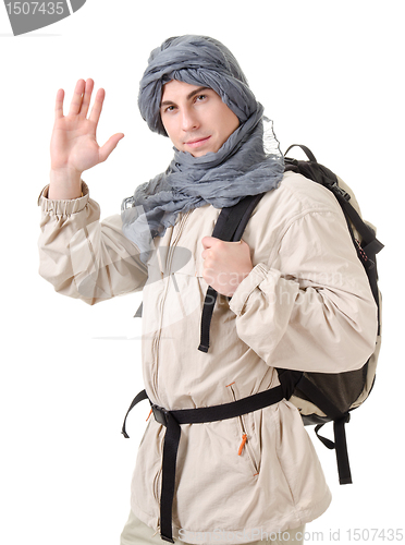 Image of tourist hiding his head under a shawl