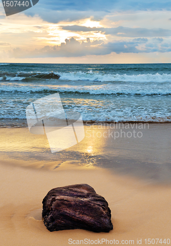 Image of ocean shore at sunset