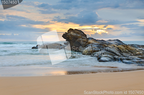 Image of ocean shore at sunset