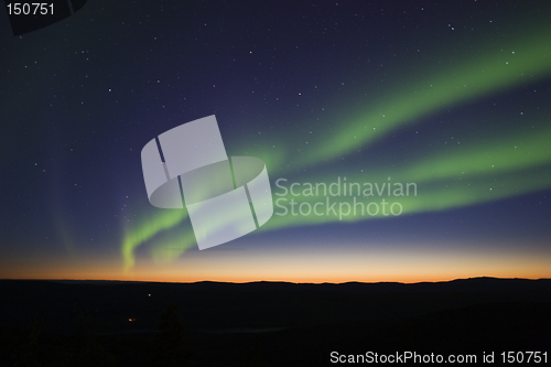 Image of 3 aurora strips over twilight