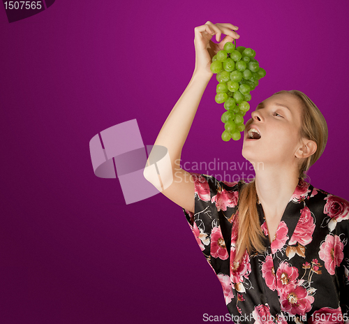 Image of woman with grapes