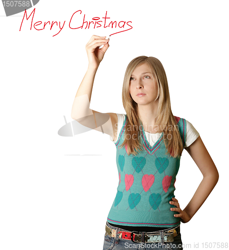 Image of woman writting Merry Christmas