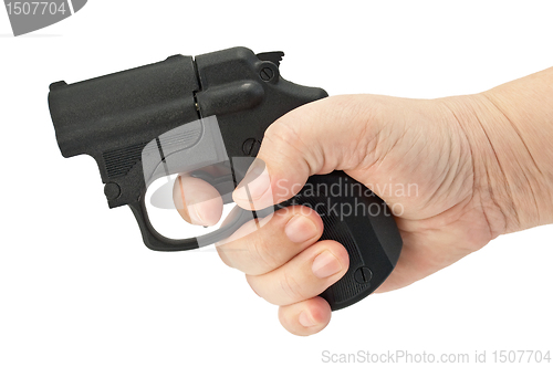 Image of Traumatic pistol in his hand