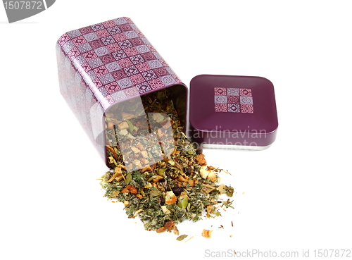 Image of Set of dried herbs, fruits and spices for tea in a box.