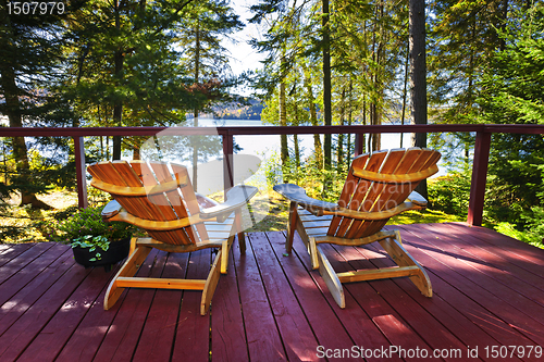 Image of Forest cottage deck and chairs