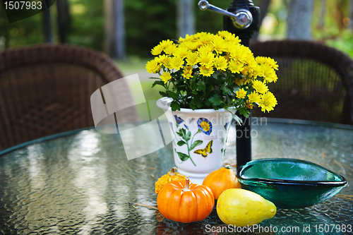 Image of Fall table with gourds and flowers