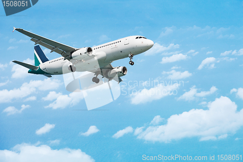 Image of Airliner on the cloudy sky