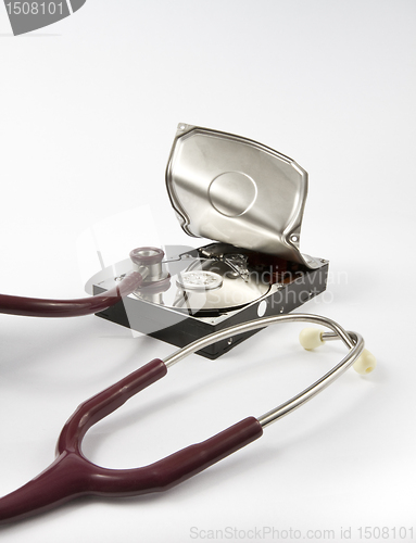 Image of Open hard drive with stethoscope