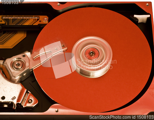 Image of red platter from open hard drive