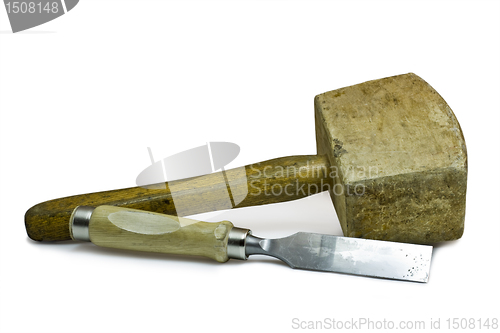 Image of wooden hammer and chisel