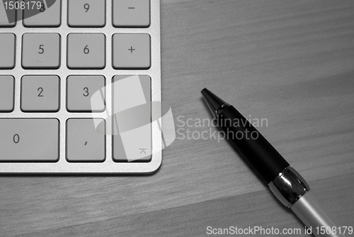 Image of keyboard and pen