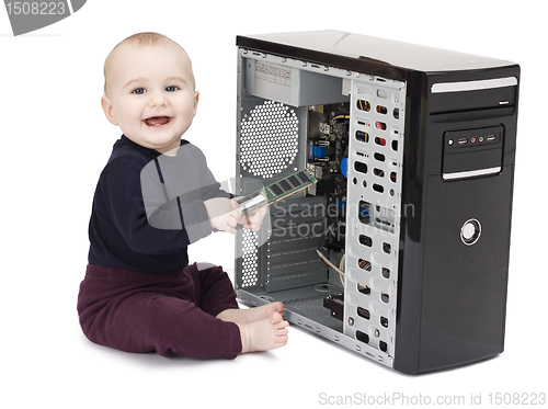 Image of young child with open computer