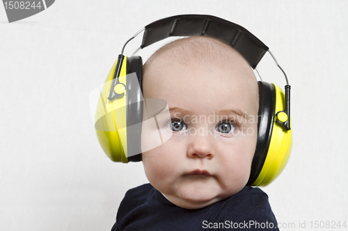 Image of baby with ear protection