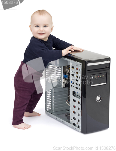 Image of young child with open computer