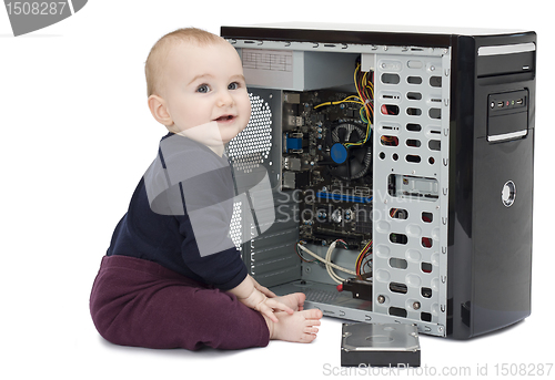 Image of young child with open computer