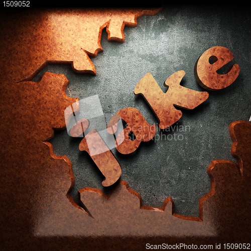 Image of red wood word on concrete