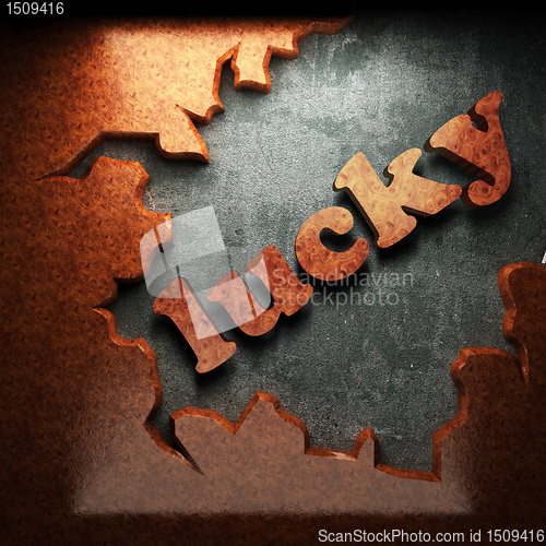 Image of red wood word on concrete