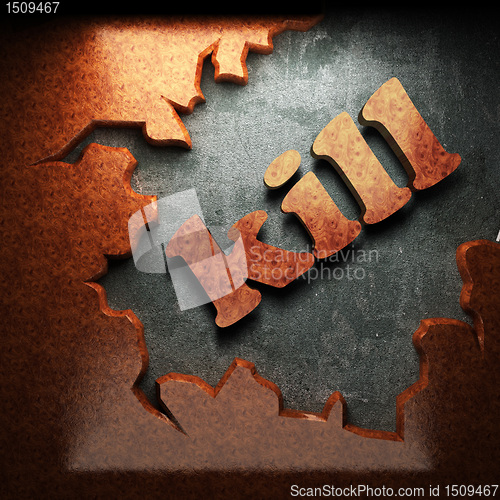 Image of red wood word on concrete
