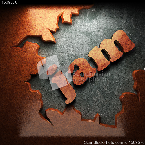 Image of red wood word on concrete