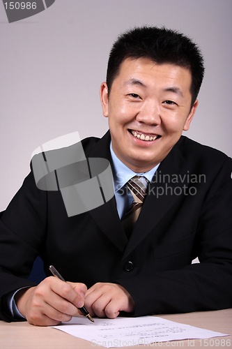 Image of Businessman Writting