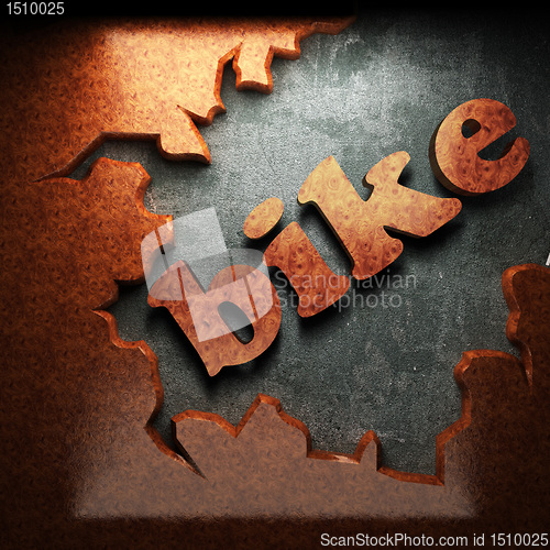 Image of red wood word on concrete