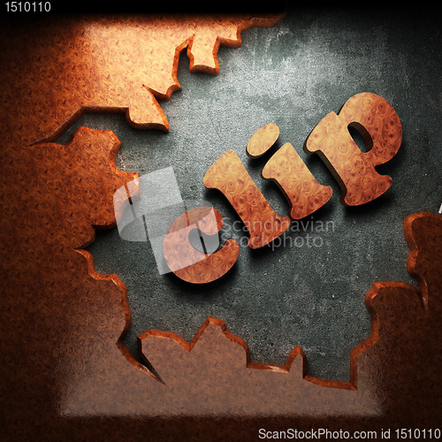 Image of red wood word on concrete