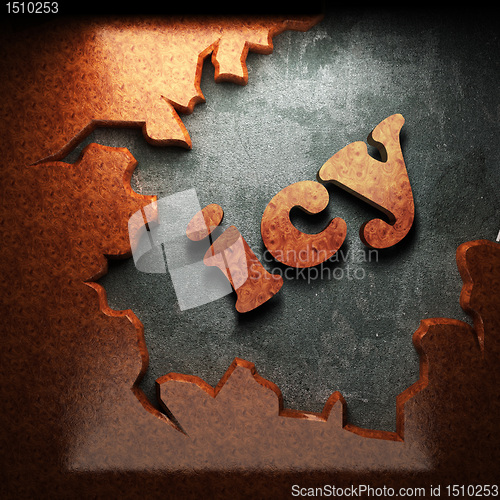Image of red wood word on concrete