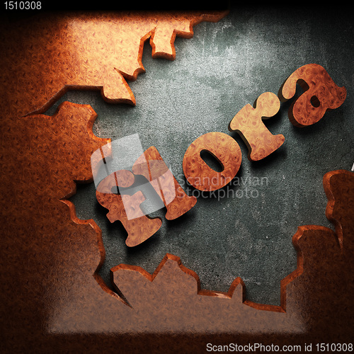Image of red wood word on concrete