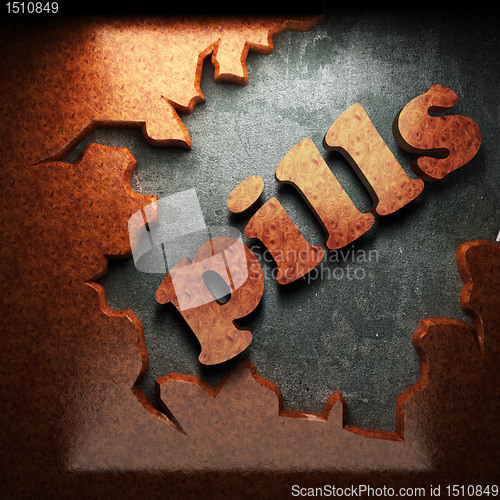 Image of red wood word on concrete