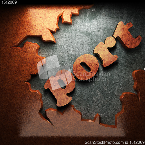 Image of red wood word on concrete