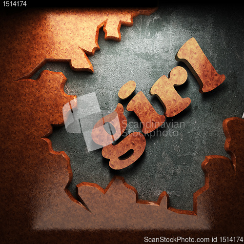 Image of red wood word on concrete