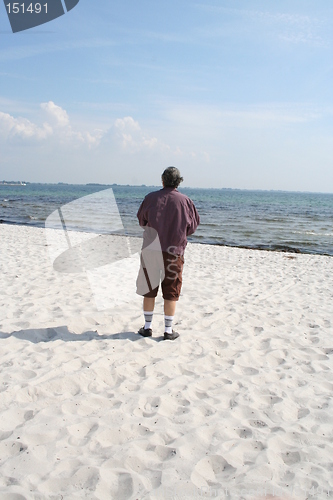 Image of Man ,beach and sea