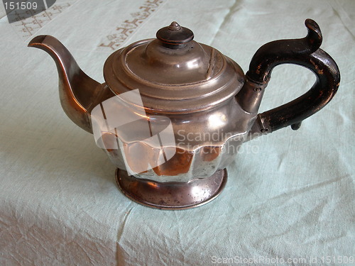 Image of Old tea pot in pewter