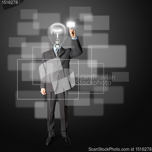 Image of full length businessman with lamp-head push the button