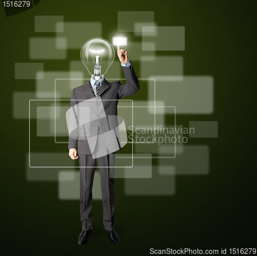 Image of full length businessman with lamp-head push the button