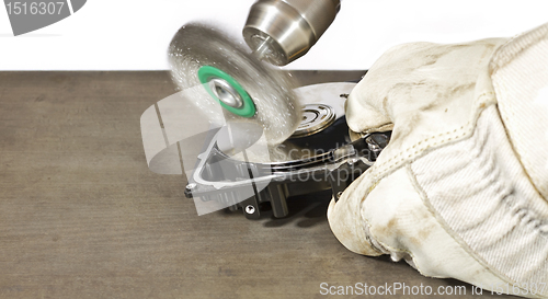 Image of scratch brush cleaning hard drive