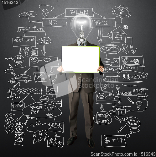 Image of happy businessman with lamp-head holding card