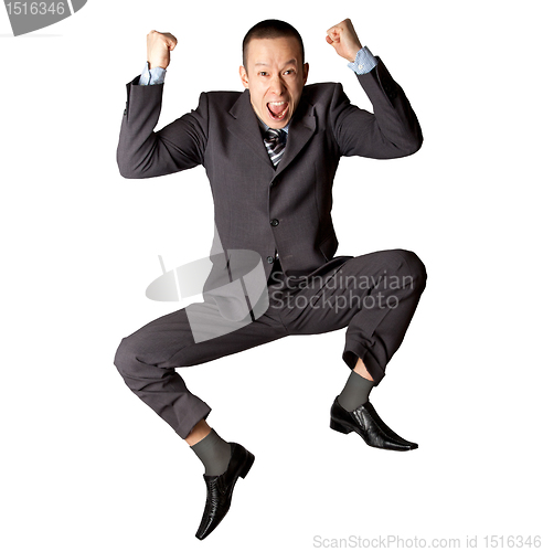 Image of Happy businessman jumping